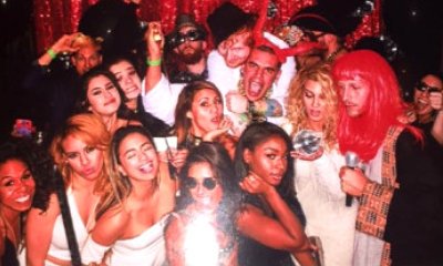 Taylor Swift and Calvin Harris Caught Kissing During Photo Booth Session
