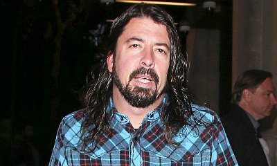 Dave Grohl Resurfaces With Crutches After Leg Injury in Sweden