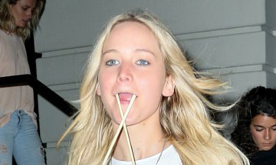 Jennifer Lawrence Makes Funny Face With Chopsticks in Her Mouth