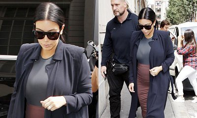 Kim Kardashian's Baby Bump Is Apparent as She Steps Out in Form-Fitting Outfit in Paris
