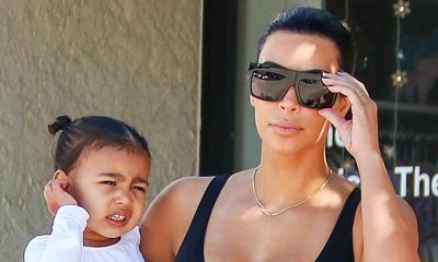 Kim Kardashian Struggles to Coax Upset North West