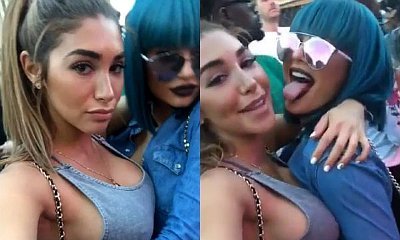 Kylie Jenner Flaunts Butt Cheek in Ripped Denim Shorts While Wearing Blue Wig