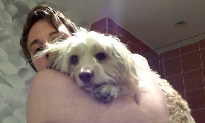 Lena Dunham Marks National Mutt Day With Topless Photo