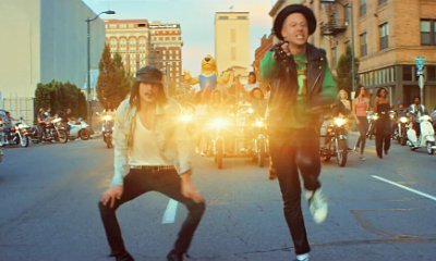 Macklemore Joins a Biker Gang in Music Video for New Single 'Downtown'