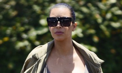 Pregnant Kim Kardashian Bares Baby Bump While Working Out on the Beach