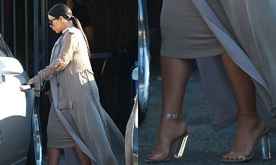 Kim Kardashian Tries to Keep Her Balance as Her Heels Buckle Under the Strain
