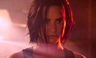 Demi Lovato Previews Action-Packed 'Confident' Music Video