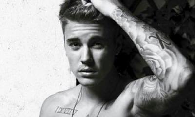Justin Bieber Shares Sexy Photo Amid Report He Threatens to Sue Over His Naked Photos