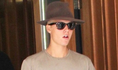 Justin Bieber Threatens to Sue Over Naked Photos in Bora Bora