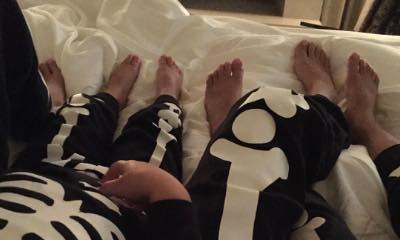 Kourtney Kardashian and Kids Dress in Matching Skeleton Pajamas