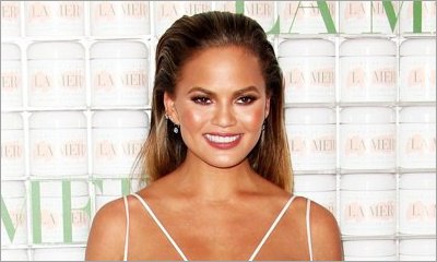 Pregnant Chrissy Teigen Shows Off Baby Bump