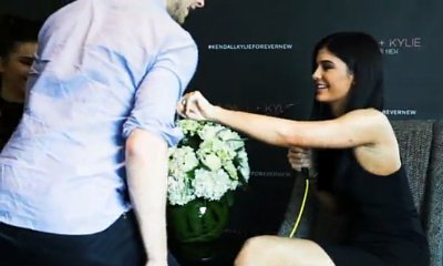 Kylie Jenner Makes Australian Radio Host Blush as She Touches His Pecs