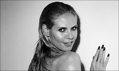 Being Cheeky, Topless Heidi Klum Crawls Over the Wall in New Sexy Photo