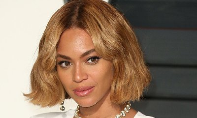 Beyonce Steps Out in Oversized Jacket. Is She Hiding a Baby Bump?