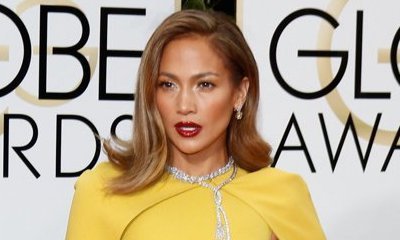 Jennifer Lopez Stuns as She Recreates Angelina Jolie' Leg-Baring Pose at the Golden Globes