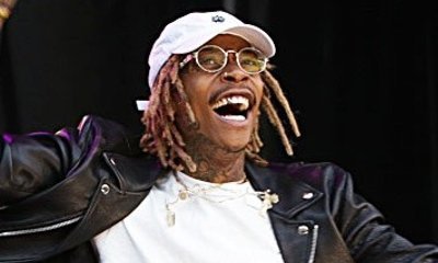 Wiz Khalifa Continues Feud With Kanye West, Disses Him at Concert