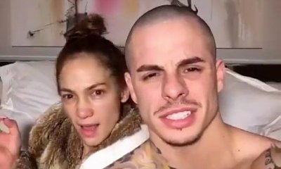 Jennifer Lopez Goes Makeup Free in Ridiculous Video With Casper Smart in Bed