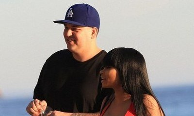 Rob Kardashian Looks on as Blac Chyna Gets Topless During Beach Photo Shoot