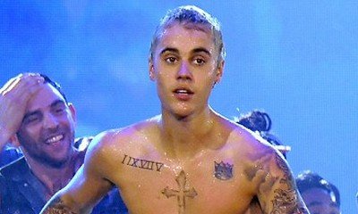 Justin Bieber Goes Wet and Shirtless During His Purpose World Tour in Seattle