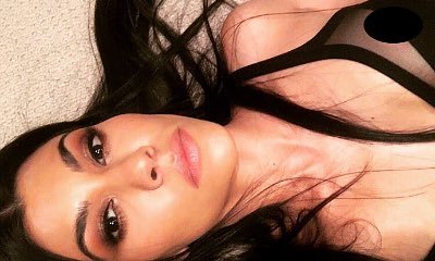 Kourtney Kardashian Has a Nip Slip While Wishing Fans Goodnight