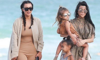Kim Kardashian Forgets Her Beachwear During Beach Day With North, Penelope and Kourtney