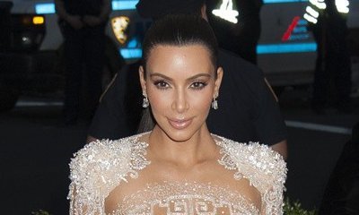 Take a Look at Kim Kardashian's First Swimsuit Photo Since Giving Birth to Saint