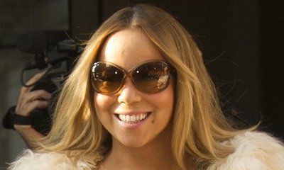 Mariah Carey Flashes Bum in Skimpy Dress as She Embraces Another Man. See the Racy Pic!