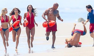 Oops! Zac Efron Takes a Big Tumble in New 'Baywatch' Pic and Pokes Fun at It