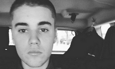 Emotionless Justin Bieber Attends Dad's Engagement Party and Pets a Tiger