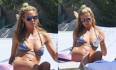 Heidi Klum Shows Off Amazing Bikini Body While Tanning in France