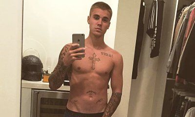 Justin Bieber Strips Down to Underwear, Holds His Crotch in Bizarre Racy Picture