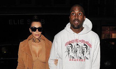 Kim Kardashian Shows Off Her Curves in Cleavage-Baring Dress During Lunch With Kanye West