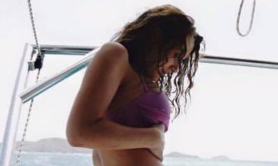 Alexa PenaVega Debuts Her Baby Bump in Bikini, Calls It 'Little Nugget'