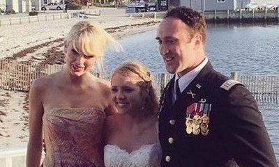 Taylor Swift Serenades Newlywed Fans and Gives Handmade Gift