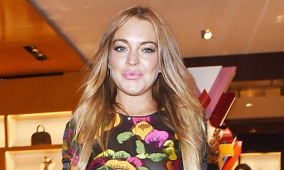 Lindsay Lohan Spotted Drinking, Smoking and Showing Tiny Baby Bump During Vacation