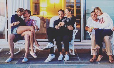 Taylor Swift Sits on Tom Hiddleston's Lap in Cute Pic With Blake Lively and Ryan Reynolds
