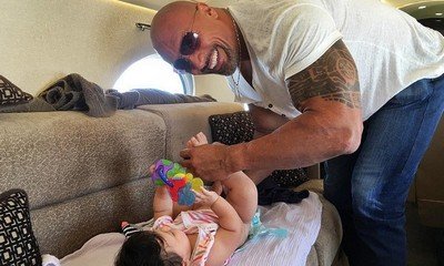 Bring on the Baby Wipes! The Rock Takes on Mid-Flight Diaper Duty With Daughter Jasmine
