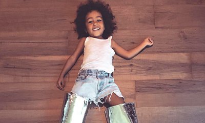 North West Already Steals Mom Kim Kardashian's Shoes. See Her Cutely Posing in $1,700 Boots