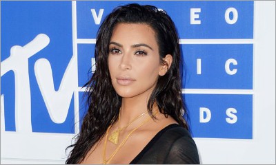 Kim Kardashian Bares Serious Underboobs While Going Topless in This Raunchy Selfie