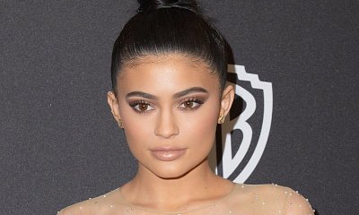 Kylie Jenner Strips Down to Lacy Lingerie and Not Much Else in This Sexy Video