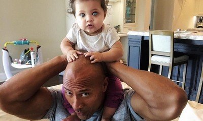 The Rock's Little Daughter Poops on His Neck While He's Giving Advice to Her