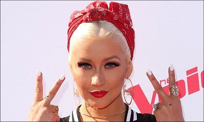 Is That a Baby Bump? Christina Aguilera Looks Pregnant When Attending Drake's Concert
