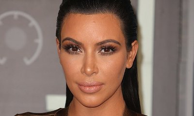 Kim Kardashian Drops Lawsuit After Tabloid Apologizes for Fake Robbery Claims