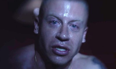 Macklemore Fighting His Demons in 'Drug Dealer' Music Video