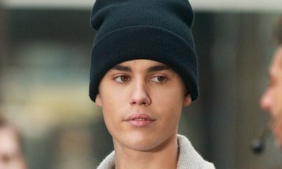 Justin Bieber Gets Pantsed by Fan, Accidentally Exposes His Bare Butt