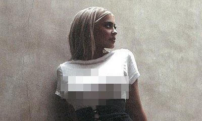 Kylie Jenner Flaunts Nipple Piercings in Tight White Leotard