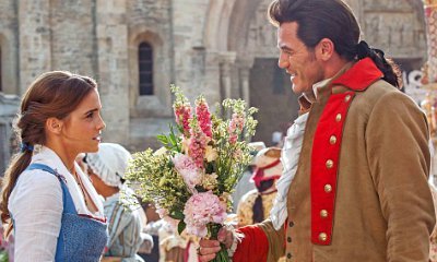 Luke Evans Flirts With Emma Watson in New 'Beauty and the Beast' Image