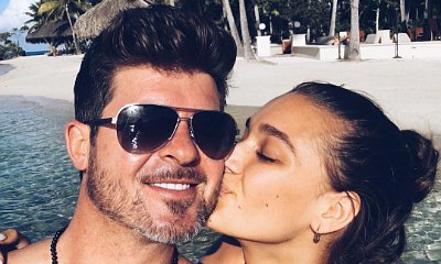 Robin Thicke's GF April Love Geary Shows Off Her Bum While Hinting That They're Married