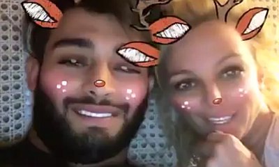 Britney Spears and Sam Asghari Cozy Up in Bed on Christmas