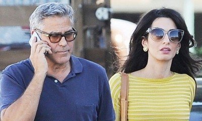 George and Amal Clooney Are 'Having a Blast Coming Up With Baby Names'